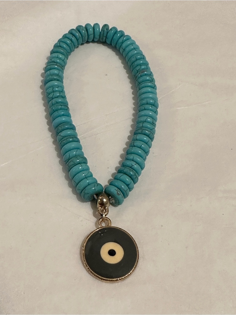 Turquoise Beaded Bracelet with Black & Cream Eye Charm